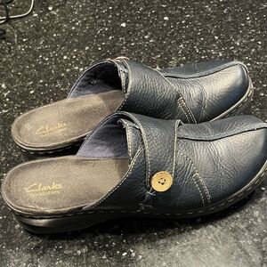 Clarks Blak Mules with Button Detail